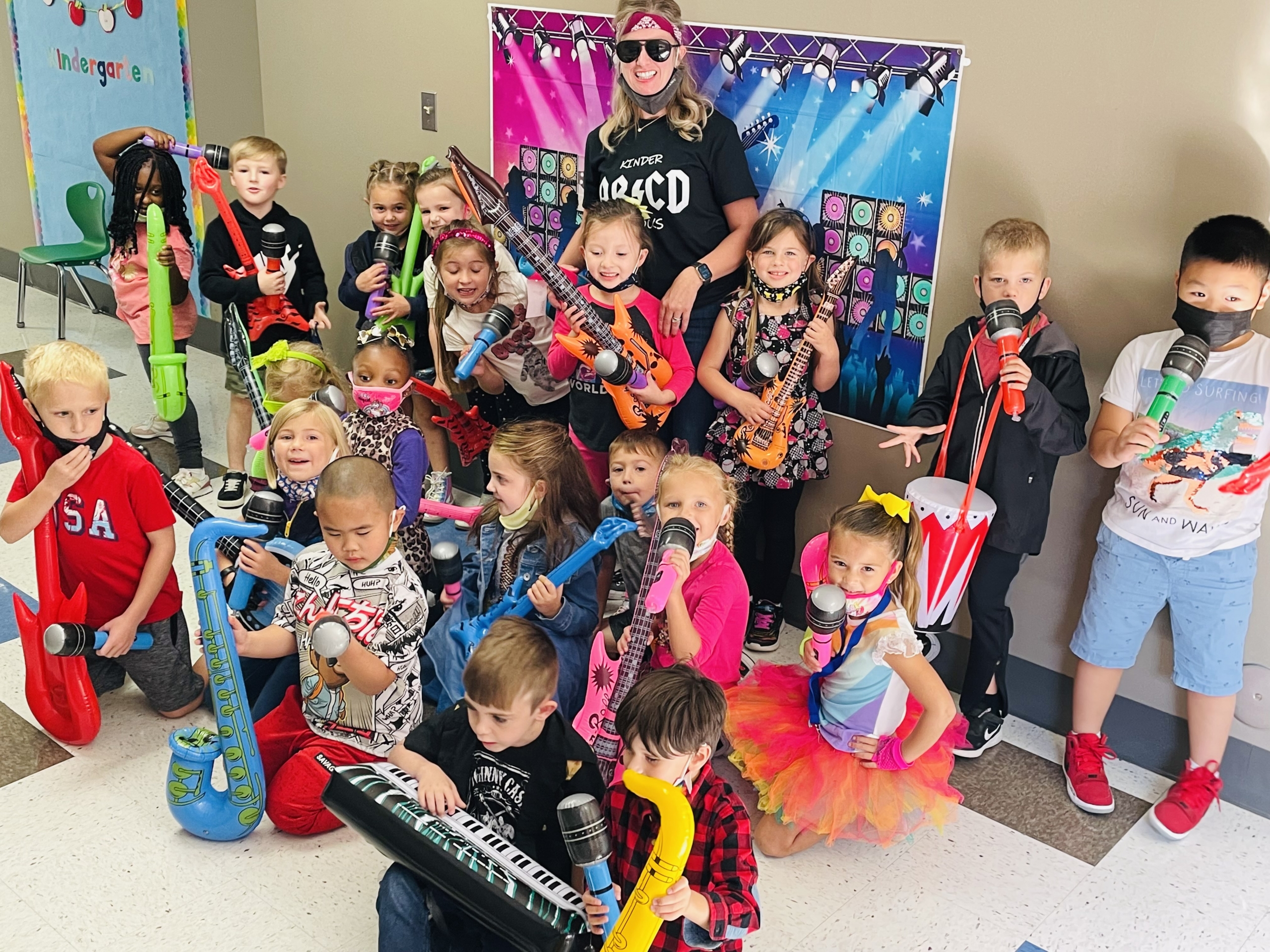 Kolling students complete 844 acts of kindness and raise over $23,000 throughout their community. Classes celebrate by Rocking out!